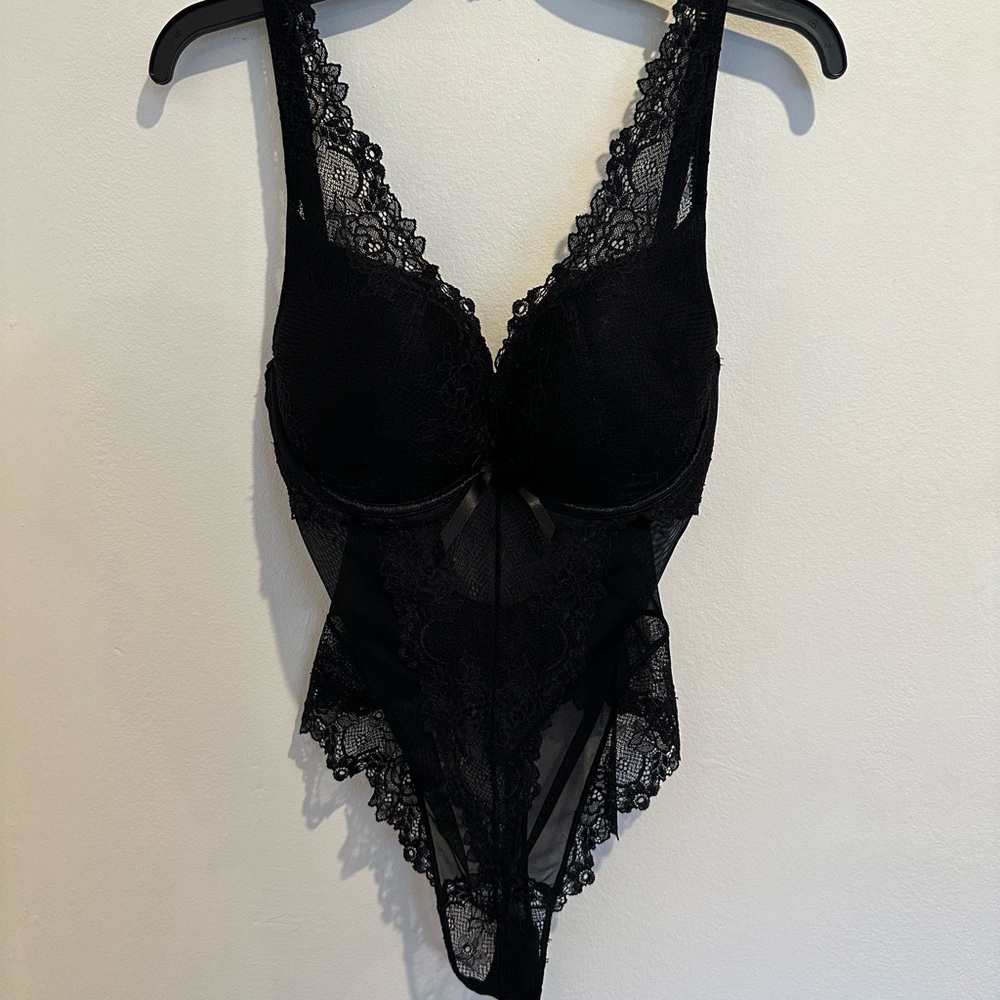 Sophisticated Black Lace Bodysuit with Sheer Panels from Paris
